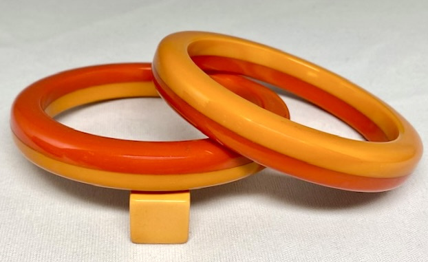 BB428 pr laminated butterscotch and burnt orange bakelite bangles